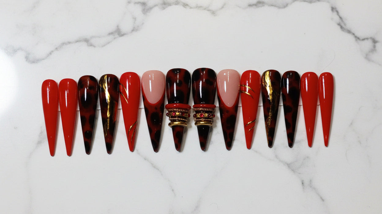 It naturally incorporates high-value search keywords like "long stiletto press-on nails," "tortoiseshell," and "luxury 3D gold accents" and bangle nails