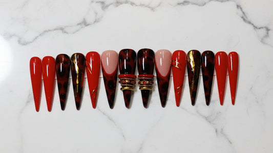 It naturally incorporates high-value search keywords like "long stiletto press-on nails," "tortoiseshell," and "luxury 3D gold accents" and bangle nails