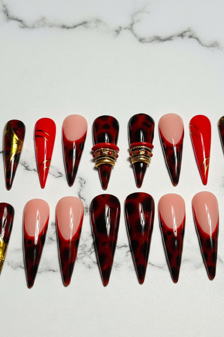 It naturally incorporates high-value search keywords like "long stiletto press-on nails," "tortoiseshell," and "luxury 3D gold accents" and bangle nails