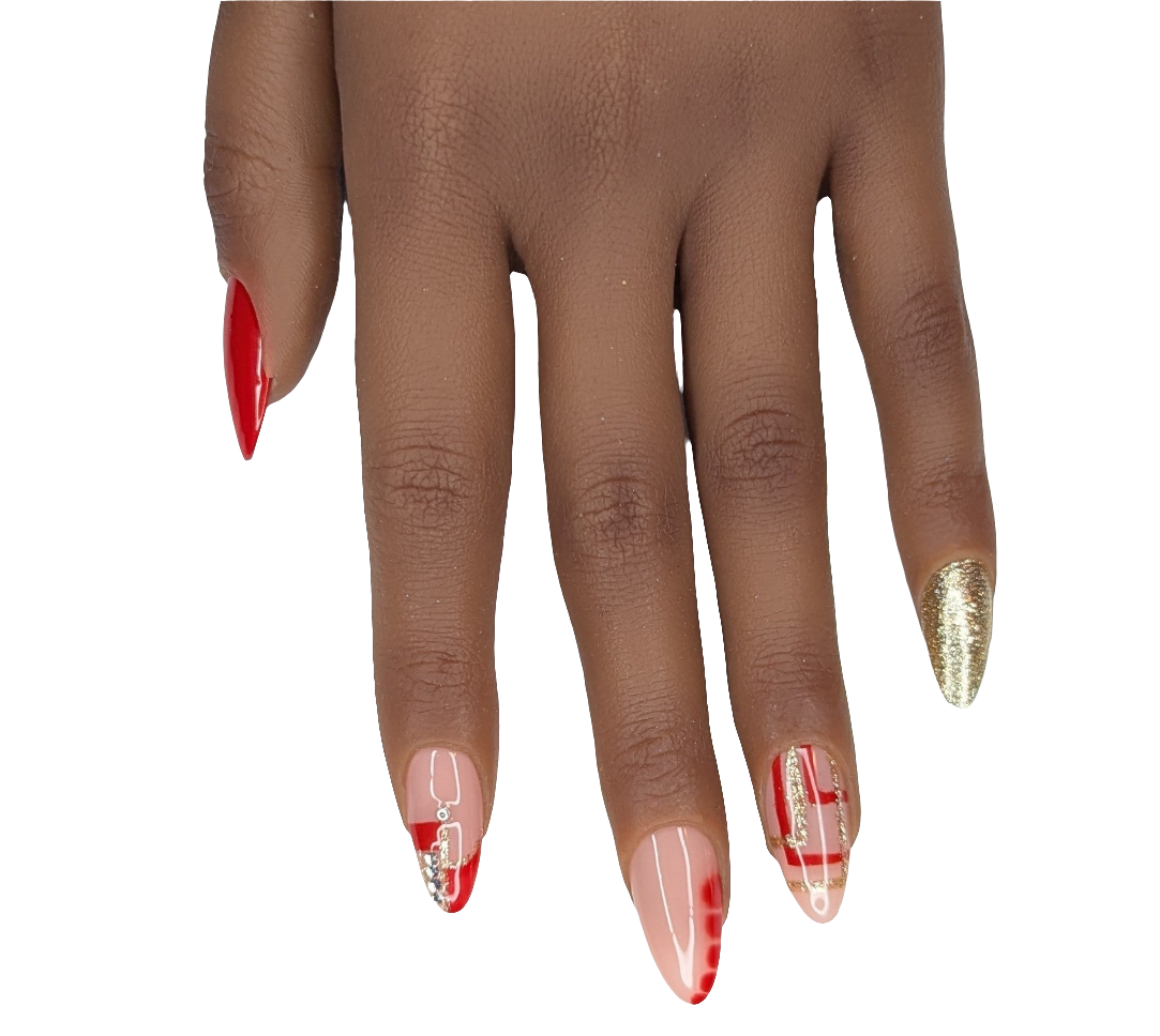 Hand with red and gold nail designs on a white background