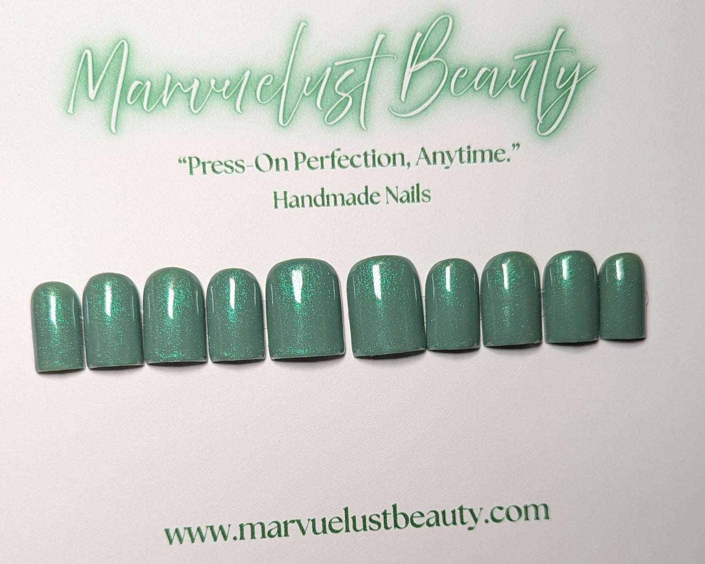 Marvuelust Beauty press-on nails displayed on a card with green nail samples.