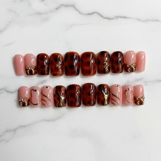 Coquette nails	Handmade press ons	Tortoiseshell nails
Trendy nails 2026	Custom fake nails	Gold bow charms
Aesthetic nails	Luxury press on nails	3D gold chrome nails
Autumn nail art	Reusable gel nails	Blush pink nails
Clean girl aesthetic	10 piece nail set	Amber jelly nails